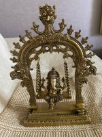 Ганеша на качелях