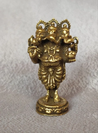 Ганеша трехголовый